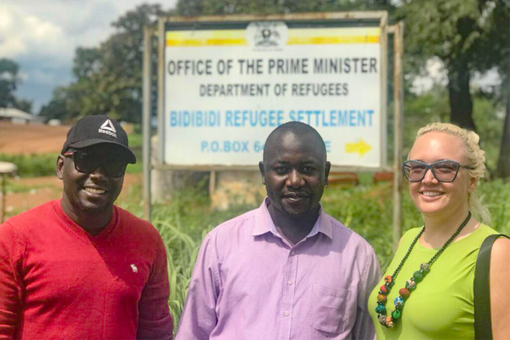 Carmen Logie (right) and Moses Okumu (left) met with local partners, including Daniel Wakibi, director of programs for Real Medicine Foundation Uganda (photo courtesy of Carmen Logie)
