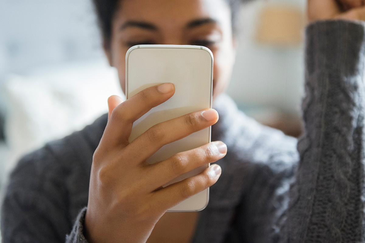 Woman looking at smartphone