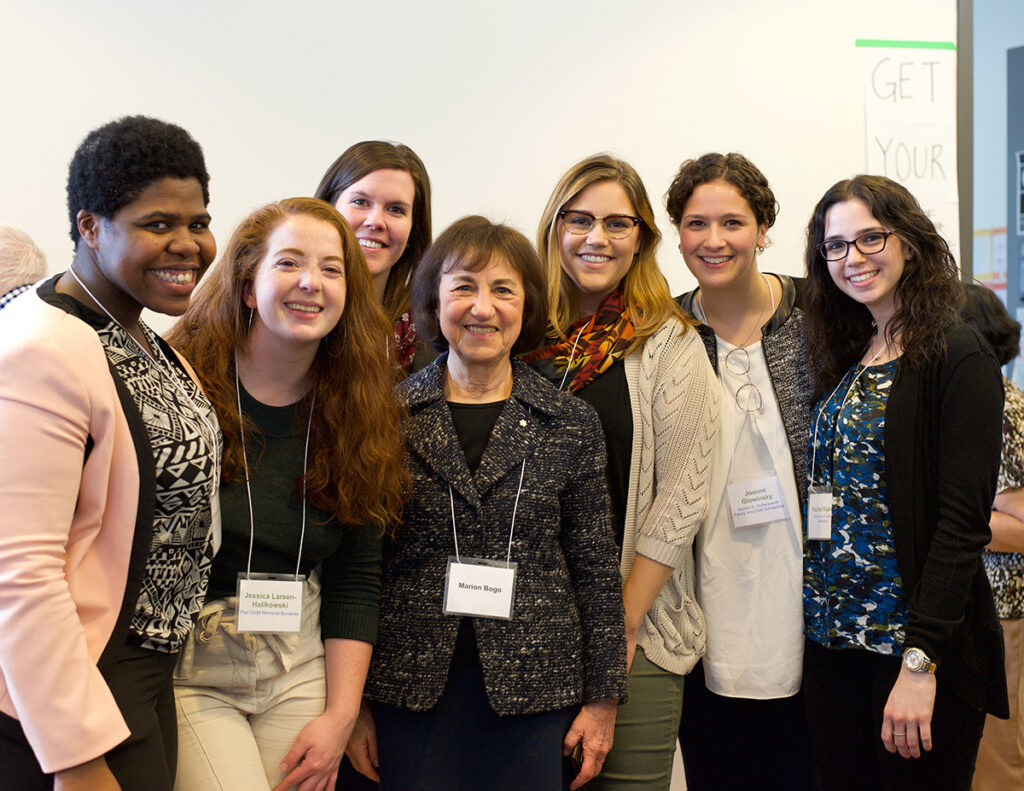 Marion Bogo, centre, posed for a photo with student award winners from the past