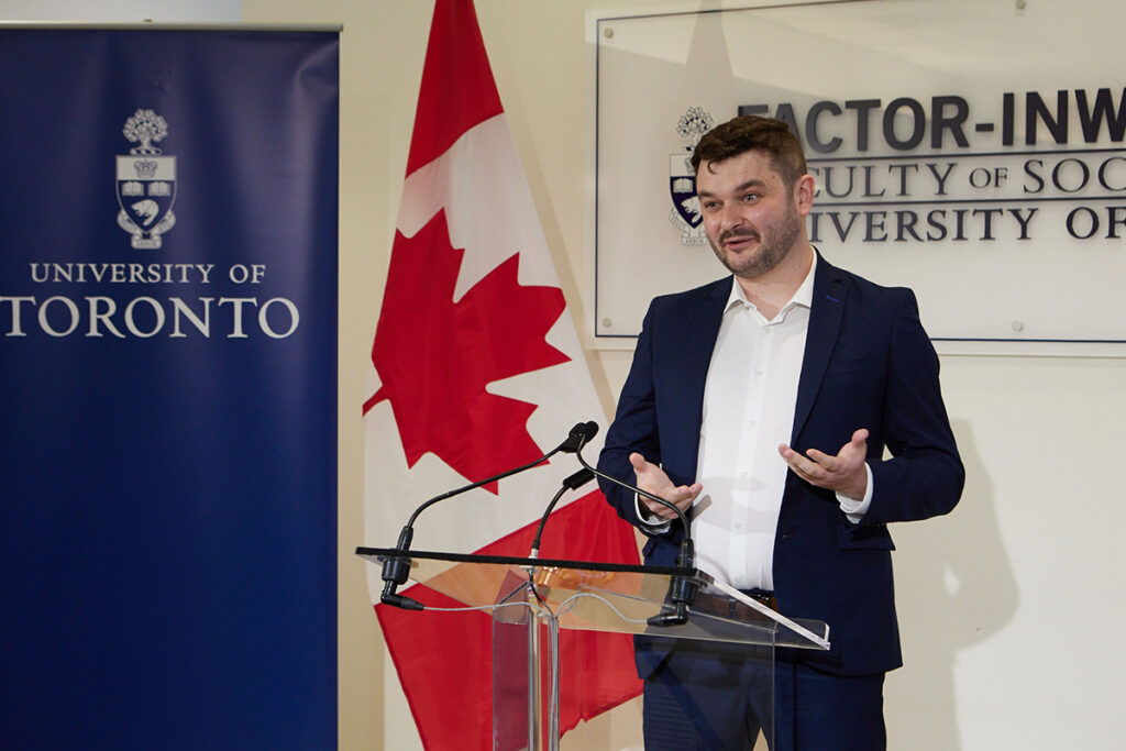 Jack Lawrence, Investigaytors participant, speaking at podium as part of Minister Carolyn Bennett's announcement of $2.8 million to support 2SLGBTQI+ Mental Health 