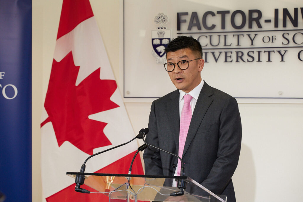 Michael Kwan, director CBRC, speaking at podium as part of Minister Carolyn Bennett's announcement of $2.8 million to support 2SLGBTQI+ Mental Health 