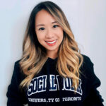 Photo of Frances Li wearing a Social Work University of Toronto sweatshirt