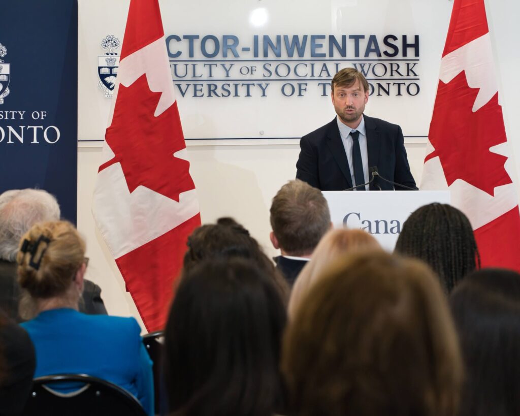 Professor David Burnes speaking at the federal government announcement