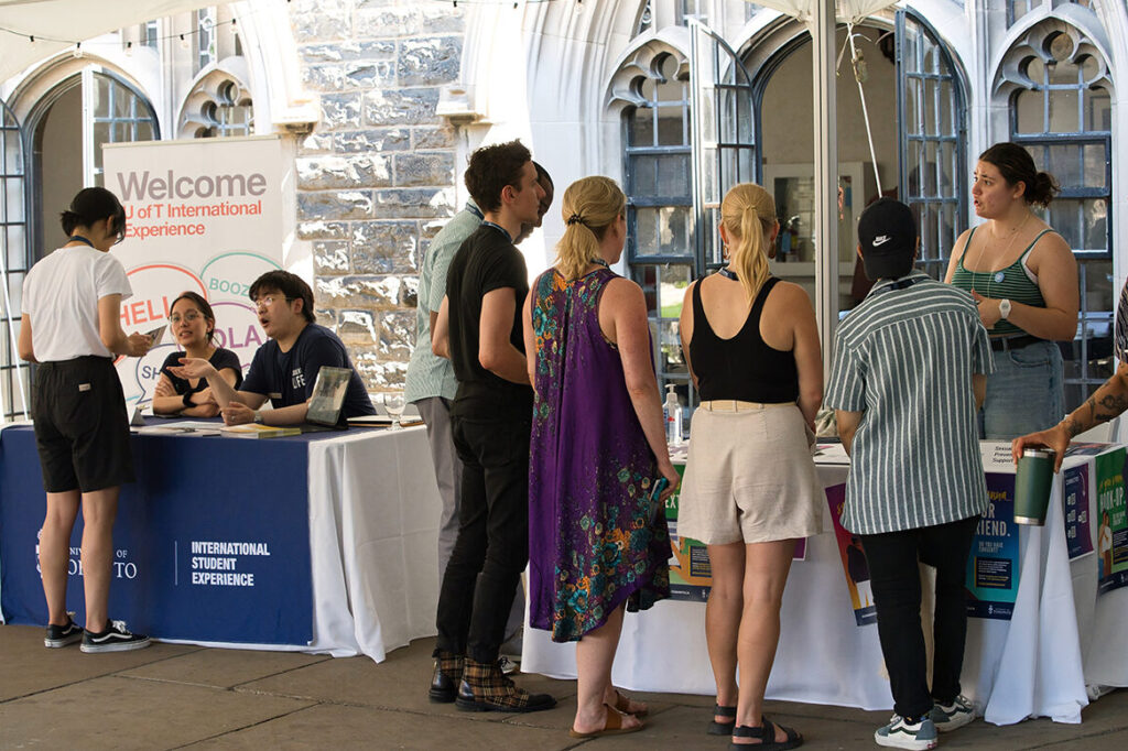 Students at an outdoor information fair