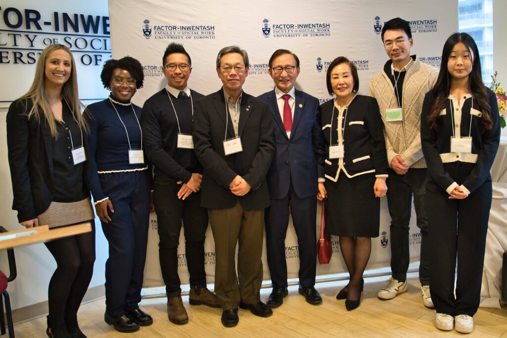Students and donors pose for a photo at an appreciation event held at FIFSW